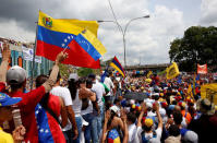 Opposition supporters take part in a rally against Venezuela's President Nicolas Maduro's government in Caracas, Venezuela, October 26, 2016. REUTERS/Carlos Garcia Rawlins