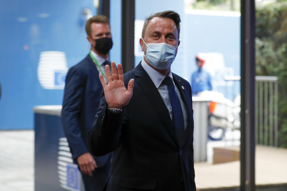 Luxembourg's Prime Minister Xavier Bettel arrives for an EU summit at the European Council building in Brussels, Thursday, June 24, 2021. At their summit in Brussels, EU leaders are set to take stock of coronavirus recovery plans, study ways to improve relations with Russia and Turkey, and insist on the need to develop migration partners with the countries of northern Africa, but a heated exchange over a new LGBT bill in Hungary is also likely. (Johanna Geron/Pool Photo via AP)