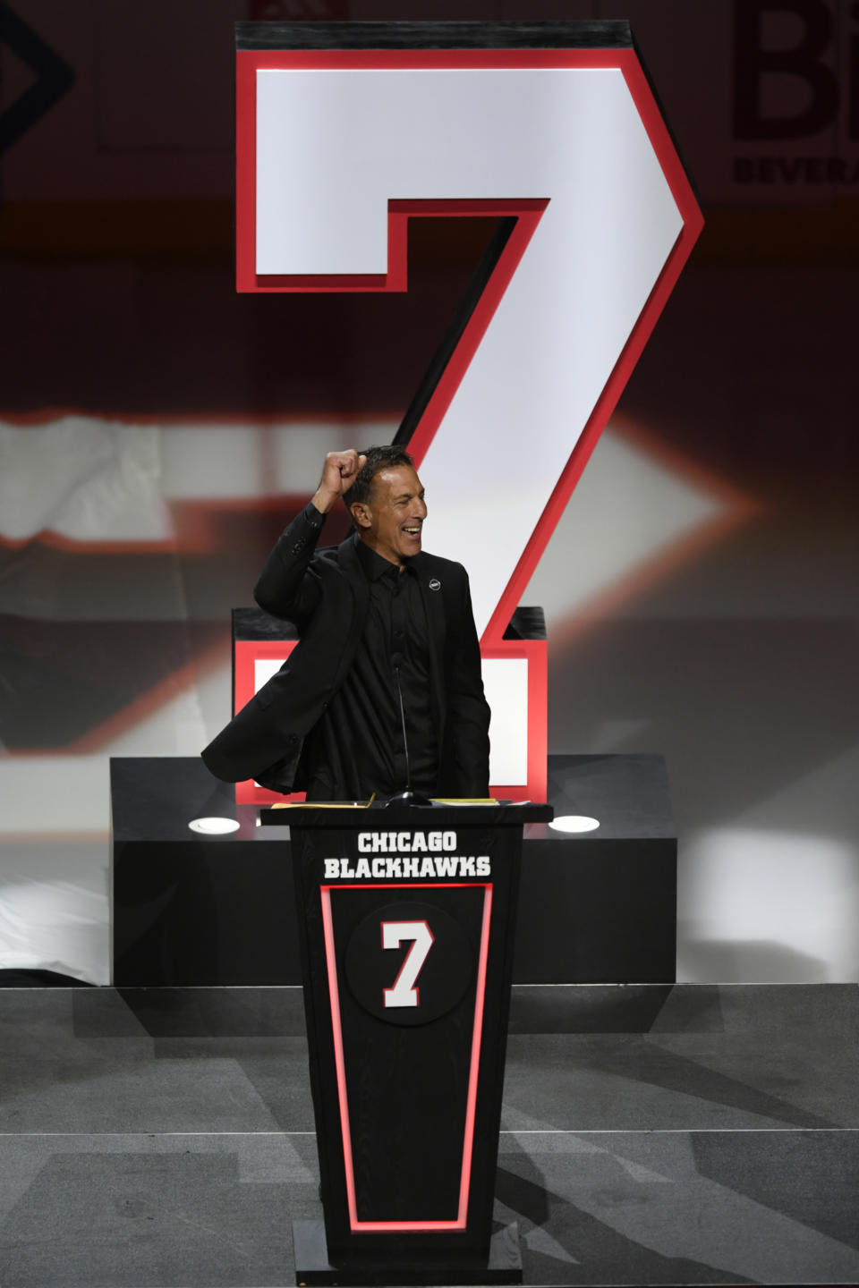 Former Chicago Blackhawks great Chris Chelios has his jersey retired during a ceremony before an NHL hockey game between the Chicago Blackhawks and Detroit Red Wings Sunday, Feb. 25, 2024, in Chicago. (AP Photo/Paul Beaty)