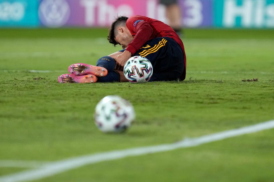 Spain's forward Alvaro Morata reacts after falling during the UEFA EURO 2020 Group E football match between Spain and Poland at La Cartuja Stadium in Seville, Spain, on June 19, 2021. (Photo by THANASSIS STAVRAKIS / POOL / AFP) (Photo by THANASSIS STAVRAKIS/POOL/AFP via Getty Images)