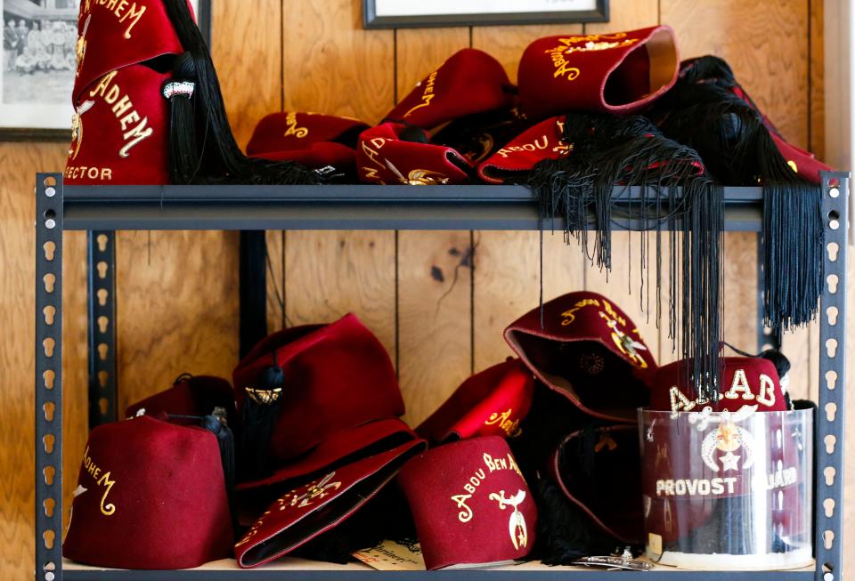 Shriners hats on a shelf inside the Abou Ben Adhem Shrine Mosque on Friday, Sept. 8, 2023. The Shrine is celebrating its 100th anniversary this fall.