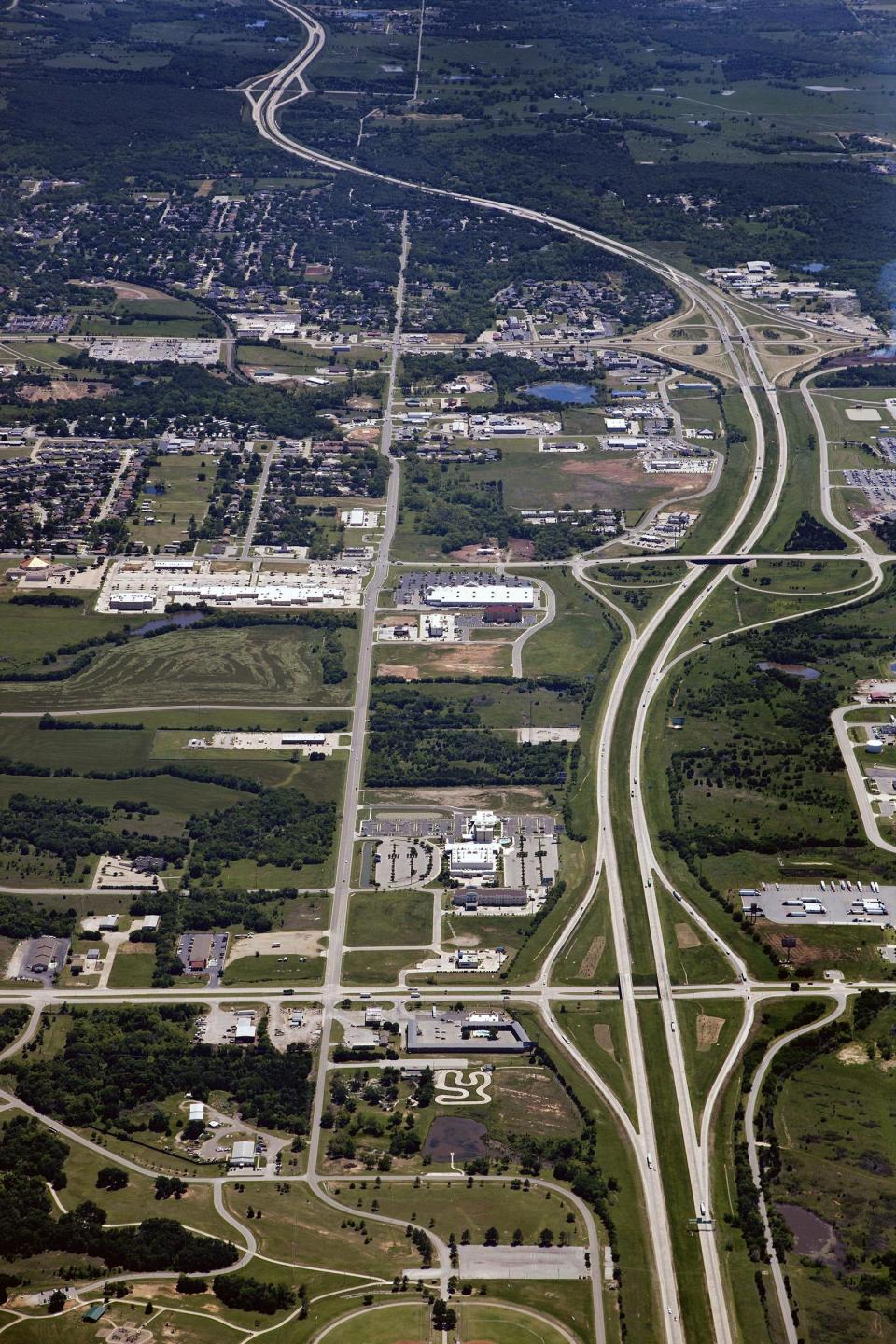 Interstate 35 is pictured looking south as it passes through Ardmore, showing exits State Highway 114/Veterans Boulevard, 12th Street and U.S. 70/SH 199/Broadway, from bottom of image.