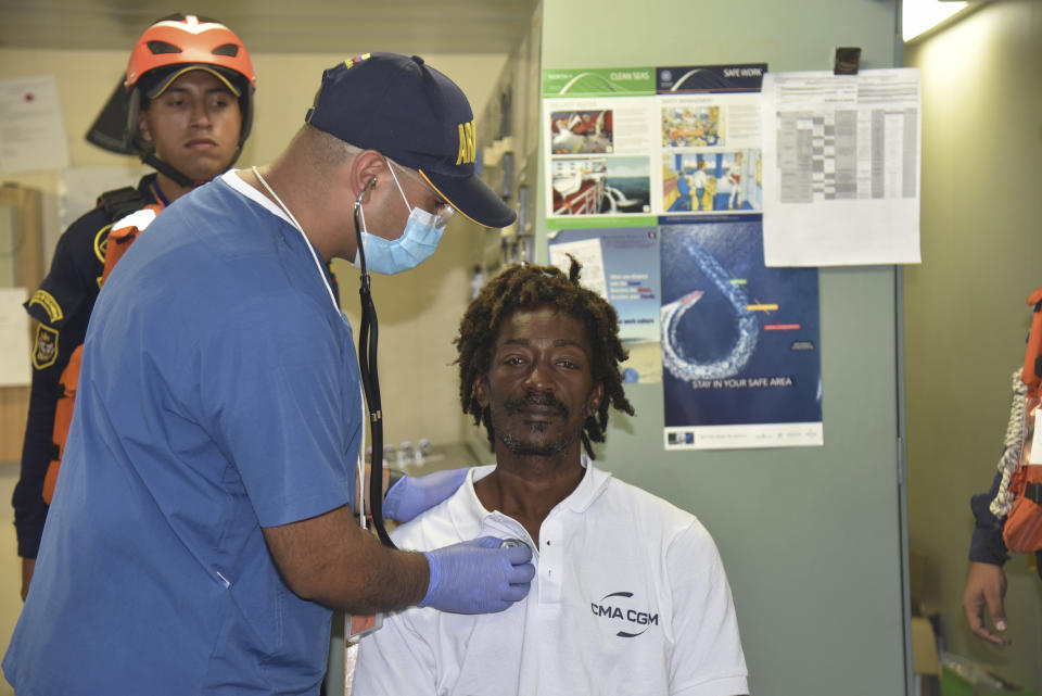 Castaway Elvis Francois being attended to by Colombian Navy members after he was rescued on Monday, Jan. 16, 2023. (Colombian Navy press office / AP)