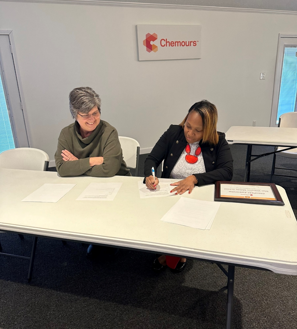 Dawn Hughes, Fayetteville Works Plant Manager, and Anita McLaughlin, Mac Williams Middle School Principal, signed a ChemFEST partnership agreement to make the multi-year partnership official on December 12.