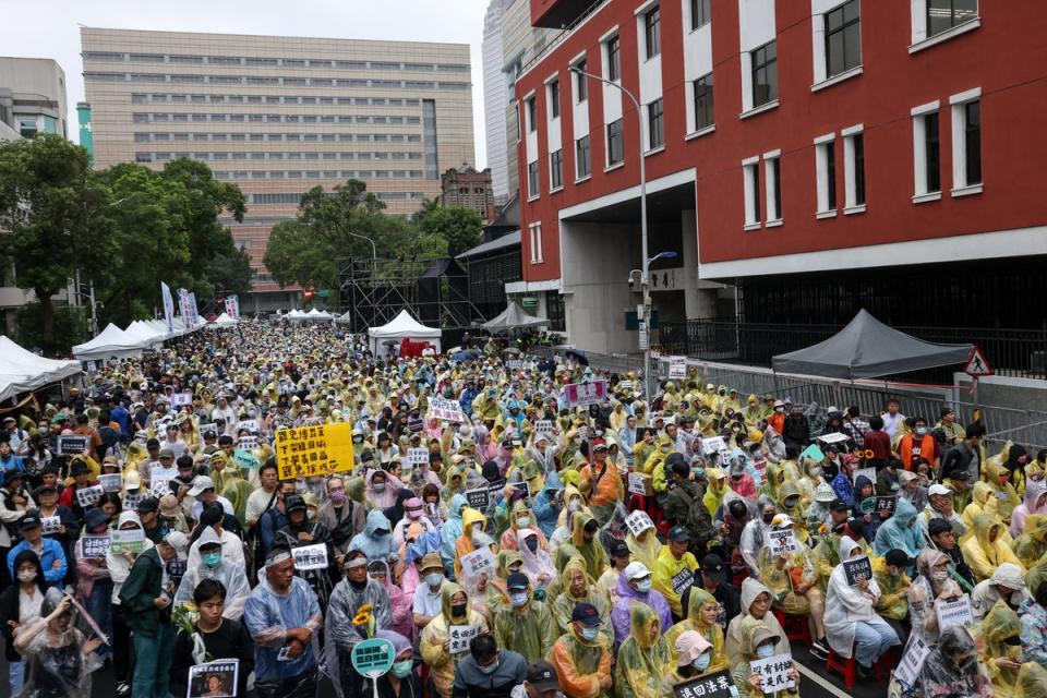 Thousands of protestors attend a rally during the vote for the Parliament reform bill outside of Legislative Yuan in Taipei (AFP via Getty Images)