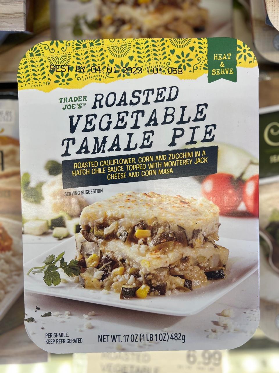 A package of Roasted Vegetable Tamale Pie: "roasted cauliflower, corn and zucchini in a Hatch chile sauce topped with Monterey Jack cheese and corn masa"