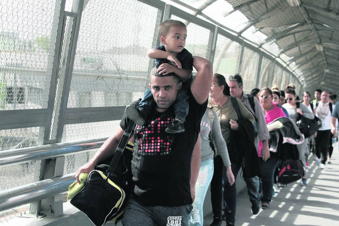 Cuban immigrants are escorted Mexican immigration authorities on April 29, 2019 in Ciudad Juárez, México as they cross into the United States to seek asylum.