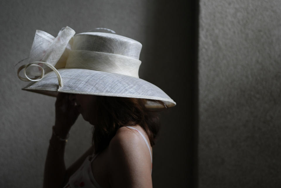 A race fan walks though the stands at Churchill Downs before the 150th running of the Kentucky Derby horse race Saturday, May 4, 2024, in Louisville, Ky. (AP Photo/Brynn Anderson)