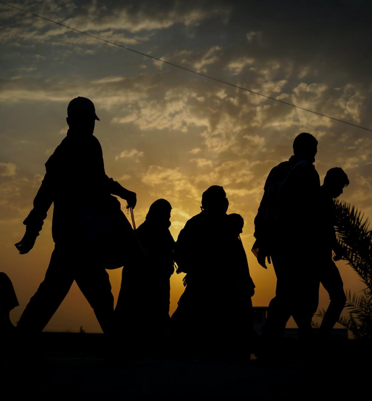 'We heal alone,' a migrant to the U.S. told a researcher. <a href="https://www.gettyimages.com/detail/photo/immigrants-walking-for-hope-in-better-future-royalty-free-image/1179649822?phrase=Immigrants+walking+for+hope+in+better+future&adppopup=true" rel="nofollow noopener" target="_blank" data-ylk="slk:Jasmin Merdan/Moment via Getty Images;elm:context_link;itc:0;sec:content-canvas" class="link ">Jasmin Merdan/Moment via Getty Images</a>