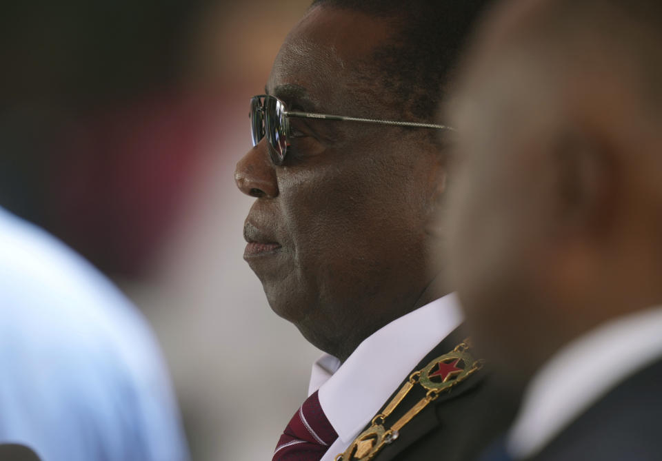 Zimbabwe President Emmerson Mnangagwa takes his oath, during his inauguration ceremony at the National Sports Stadium in the capital, Harare, Monday, Sept. 4 2023. Mnangagwa won a second and final-five year term in another disputed poll in the politically and economic troubled southern African nation. (AP Photo /Tsvangirayi Mukwazhi)