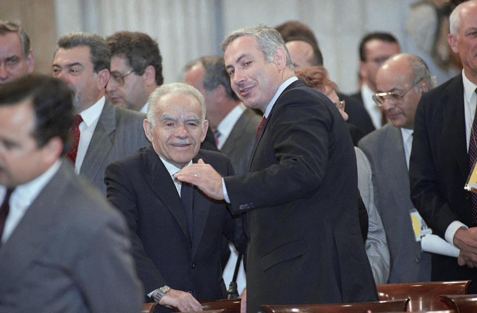 Then-Israeli Prime Minister Yitzhak Shamir, left, confers with his Deputy Foreign Minister Benjamin Netanyahu at the Madrid peace conference in October 1991. (Photo: ASSOCIATED PRESS)