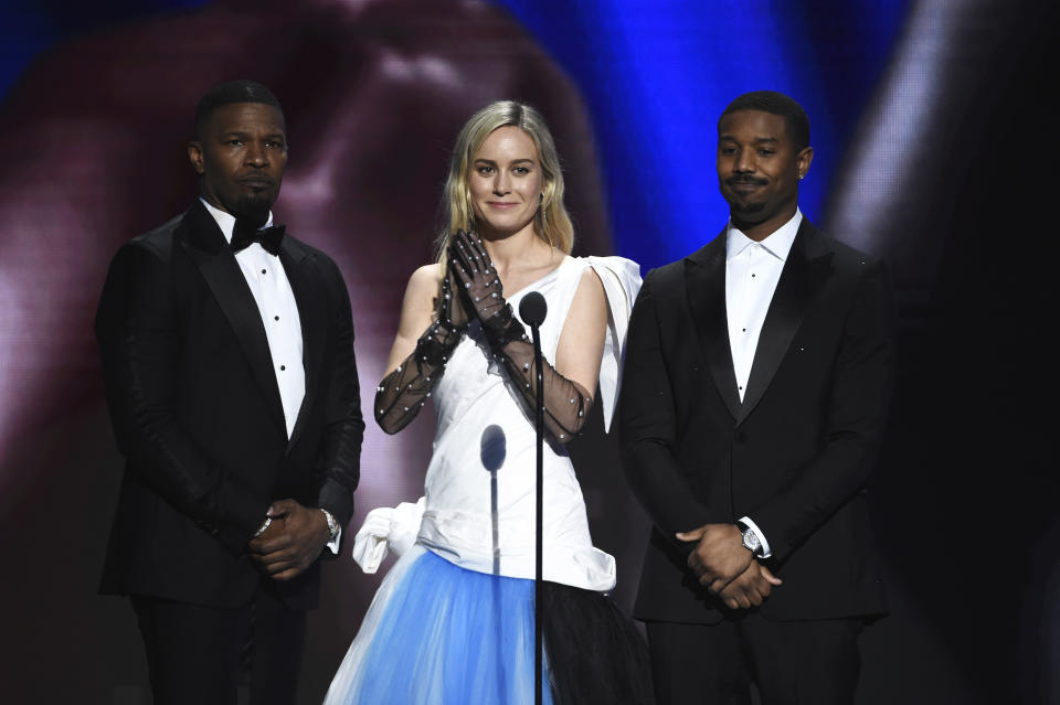 Jamie Foxx, from left, Brie Larson, and Michael B. Jordan introduce a clip from "Just Mercy" at the 51st NAACP Image Awards at the Pasadena Civic Auditorium on Saturday, Feb. 22, 2020, in Pasadena, Calif. (AP Photo/Chris Pizzello)