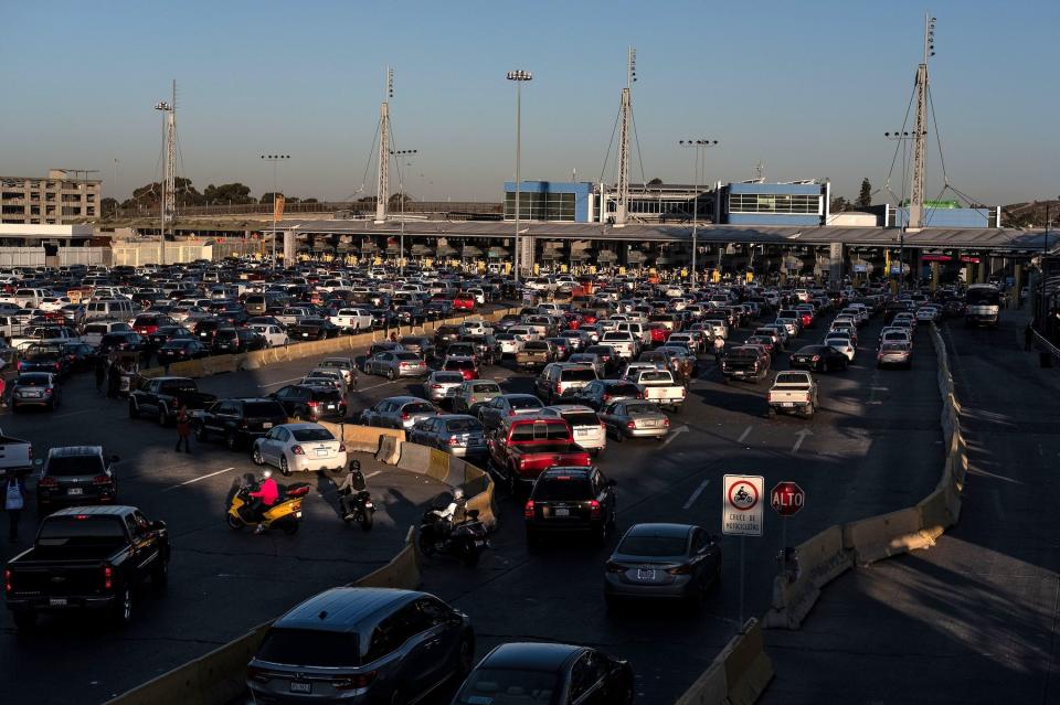 Cars line up to cross to the United States at San Ysidro port of entry, as seen from Tijuana, Baja California state, Mexico, on November 9, 2018. (Photo: GUILLERMO ARIAS/AFP/Getty Images)