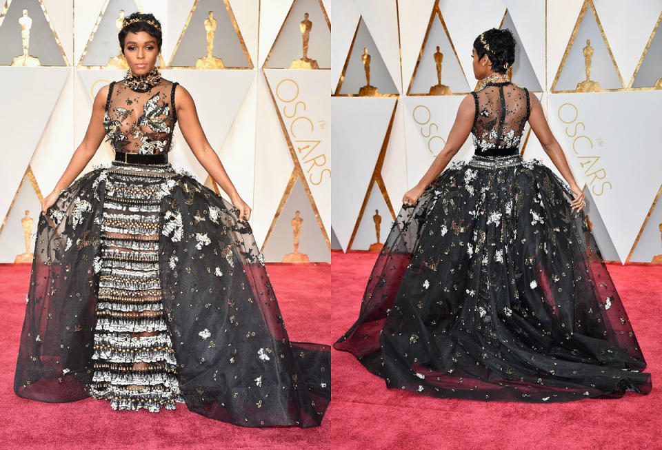 <p>The “Hidden Figures” actress dropped jaws in this black tulle Elie Saab Haute Couture gown that featured an array of sequins, feathers and jewels. The peak-a-boo bust showed just enough to be considered sexy, yet classy, and she topped off the look with a bedzazzled choker and Jennifer Behr tiara. With her skin glowing and hair on point, the actress had the standout look of the night! <strong>Grade: A+ (… if we could throw in a few extra pluses we would.) </strong> </p>