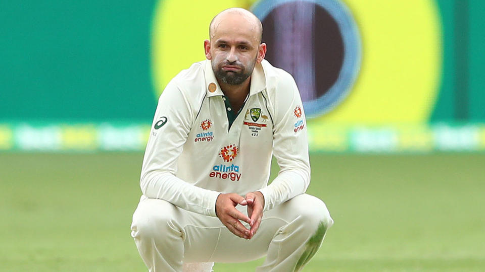 Nathan Lyon is pictured here looking dejected in the fourth Test against India.