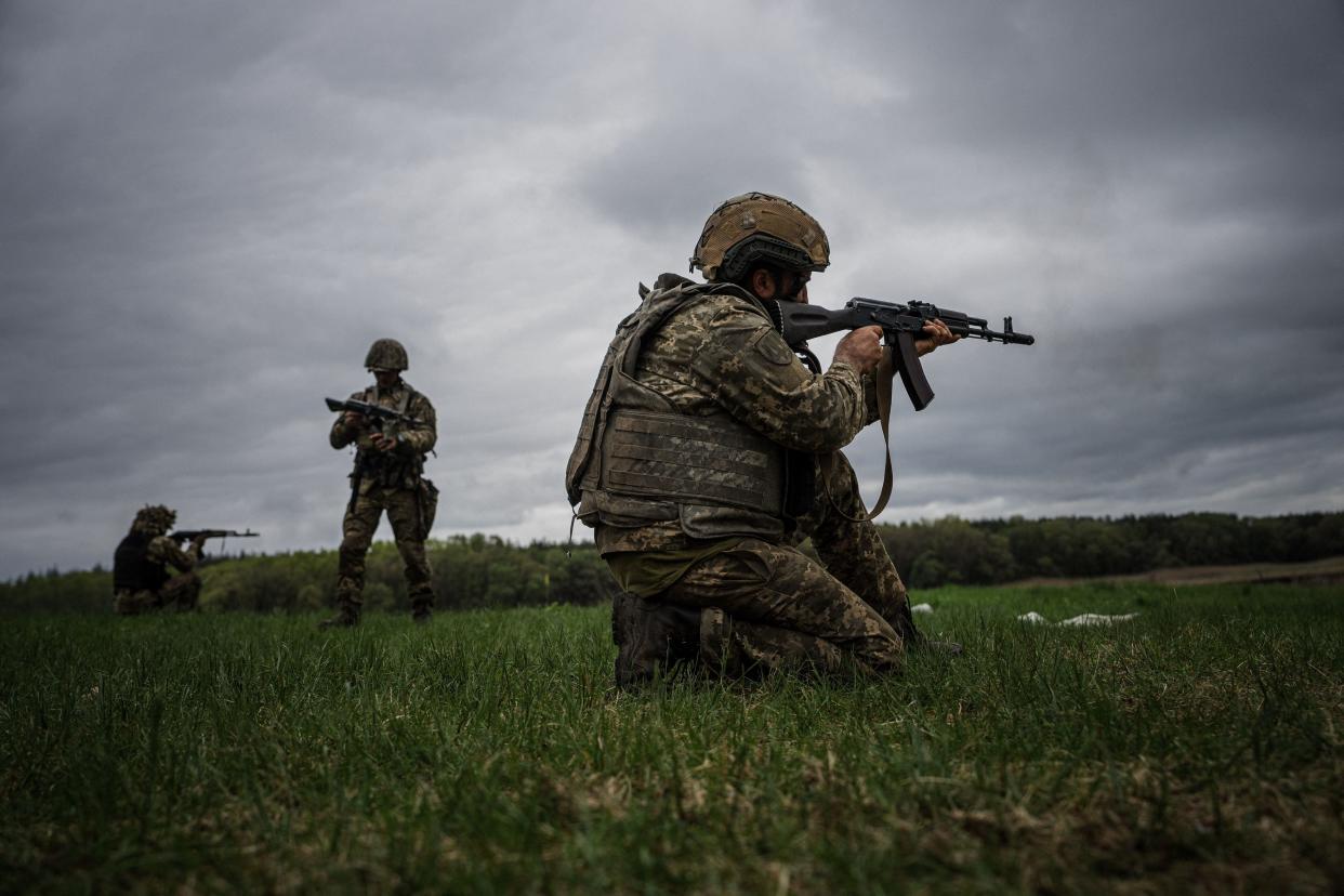 Ukrainian servicemen practice firing during a military exercise in the Kharkiv region on Monday (AFP via Getty Images)