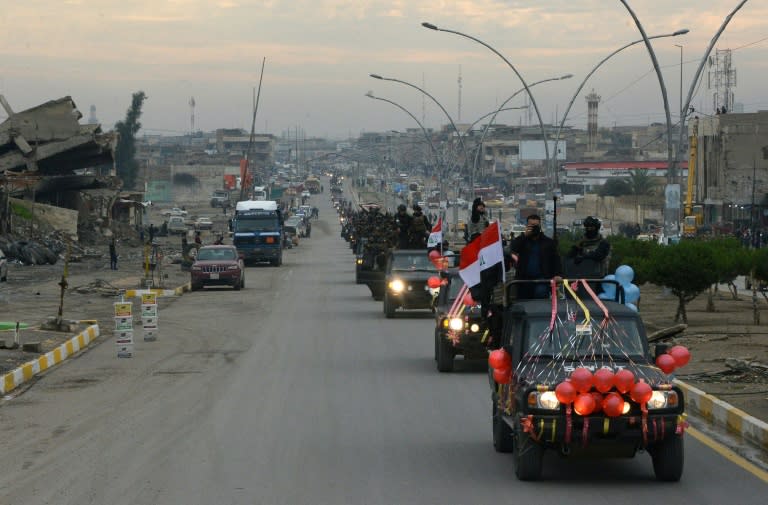 Members of the Iraqi security forces recently celebrated in the city to mark the first anniversary of the victory over the Islamic State (IS) group