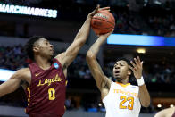 <p>Donte Ingram #0 of the Loyola Ramblers blocks a shot attempt by Jordan Bowden #23 of the Tennessee Volunteers in the second half during the second round of the 2018 NCAA Tournament at the American Airlines Center on March 17, 2018 in Dallas, Texas. (Photo by Ronald Martinez/Getty Images) </p>