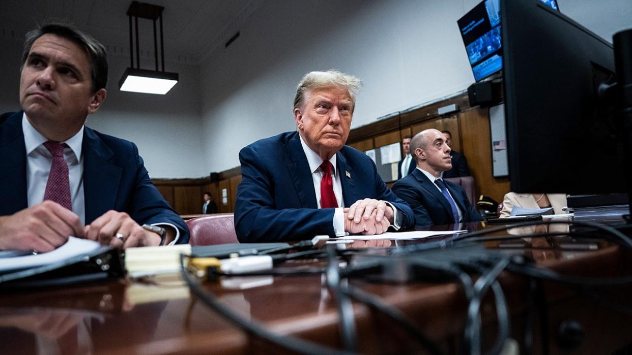 <div>Former President Donald Trump, center, at Manhattan criminal court in New York, US, on Monday, April 15, 2024. <strong>(Jabin Botsford/The Washington Post/Bloomberg via Getty Images)</strong></div>