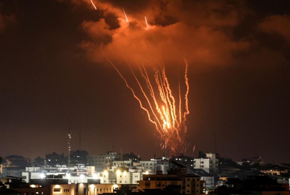 Palestinian rockets fired from Gaza City light up the night sky Aug. 5 in retaliation after a senior militant from Islamic Jihad was killed in an Israeli airstrike on the Gaza Strip, prompting the militant group to warn Israel has "started a war."