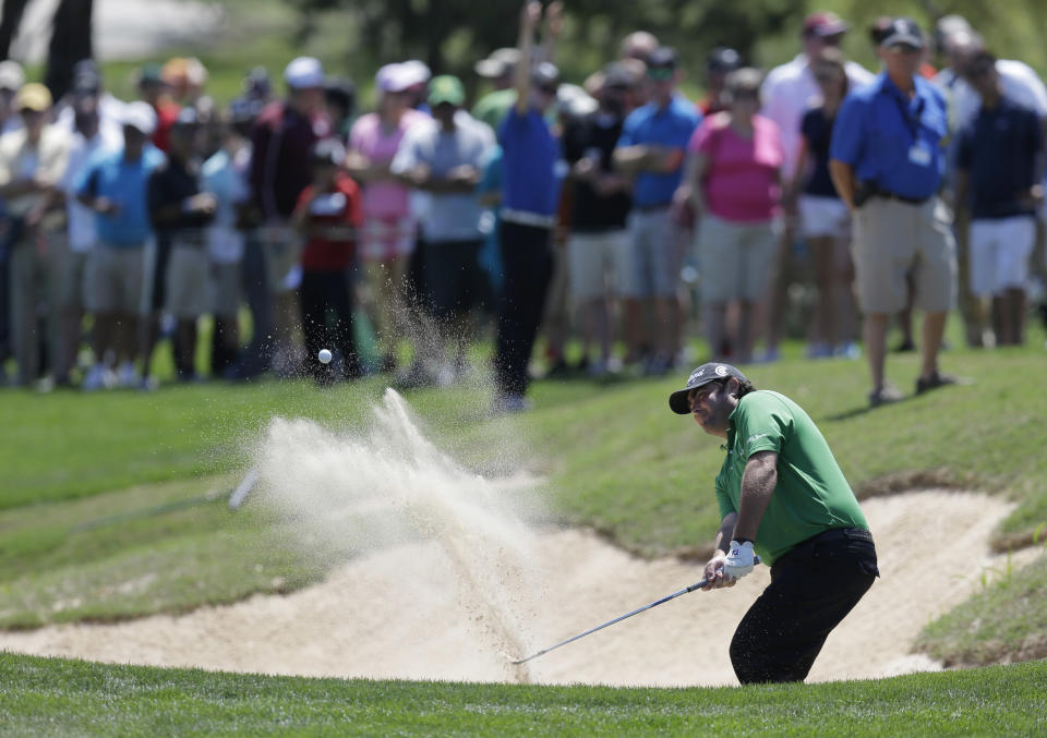 Steven Bowditch, of Australia, hits from a sand trap on the eighth hole during the final round of the Texas Open golf tournament on Sunday, March 30, 2014, in San Antonio. (AP Photo/Eric Gay)