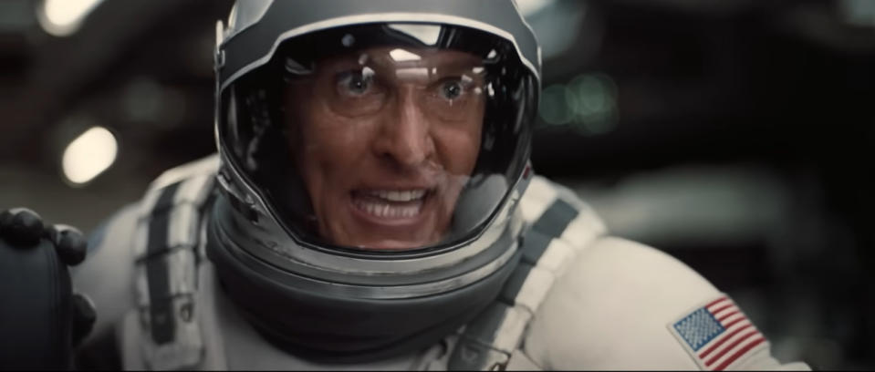 Matthew McConaughey in a spacesuit, looking intense, from a scene in the movie "Interstellar"