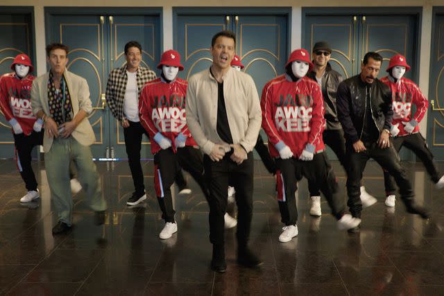 <p>NKOTB/Youtube</p> New Kids on the Block with Jabbawockeez in Las Vegas