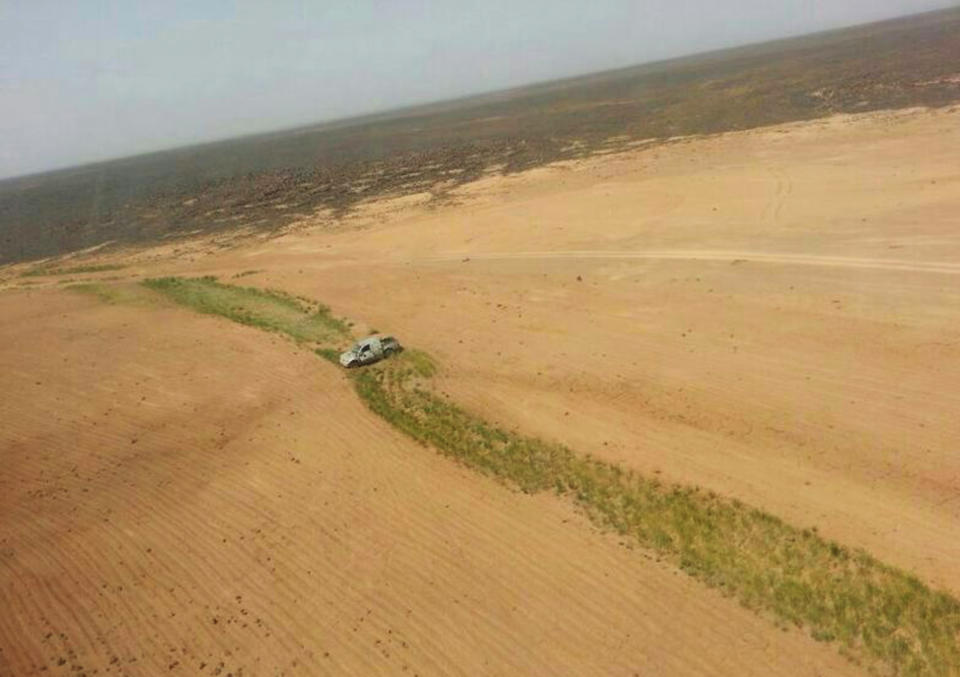 This aerial photo shows a truck after a Jordanian air strike on a convoy at the border between Jordan and Syria on Wednesday, April 16, 2014. Jordanian military warplanes struck a convoy of vehicles as they were trying to enter Jordan from Syria, the army said in a statement Wednesday, in an unusual move at a time of tensions between the desert kingdom and Damascus.(AP Photos/Ammonnews)