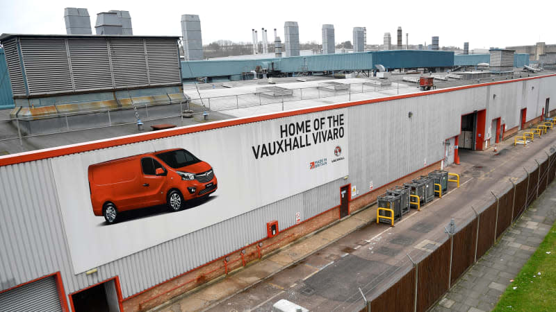An advertising hoarding showing a Vauxhall Vivaro van is seen on a wall of the Vauxhall Luton plant in Luton