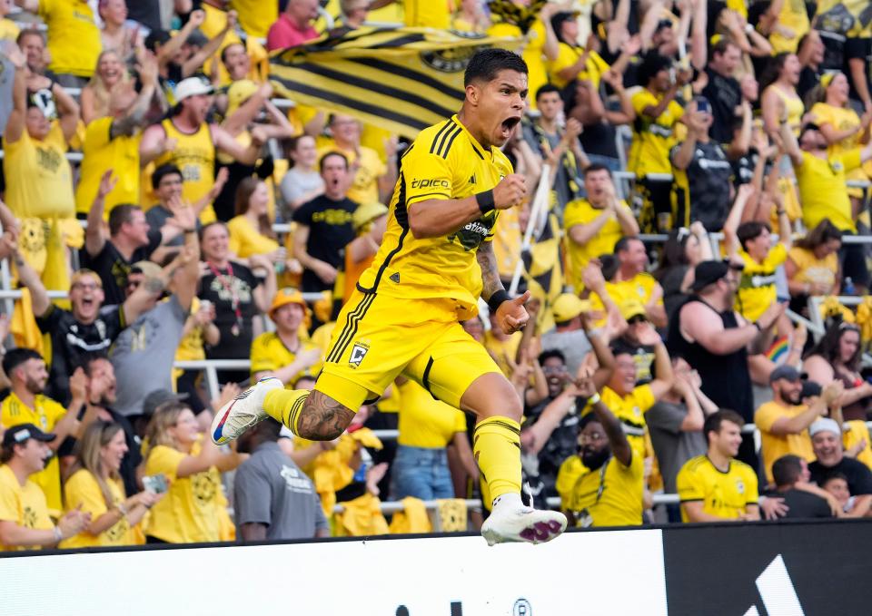 Jun 22, 2024; Columbus, OH, USA; Columbus Crew forward Cucho Hernandez (9) jumps into the air to celebrate his second goal of the game against Sporting KC goalkeeper John Pulskamp (1) during the first half of their MLS game at Lower.com Field.