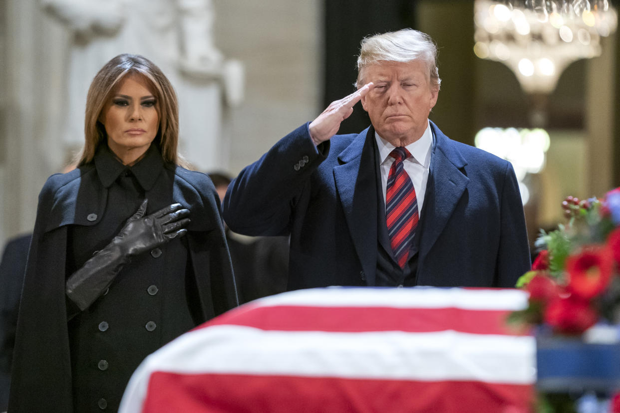 President Trump and first lady Melania Trump pay their respects in the Capitol rotunda where former President George H.W. Bush lies in state, Dec. 3, 2018. (Photo: Jim Lo Scalzo-Pool/Getty Images)