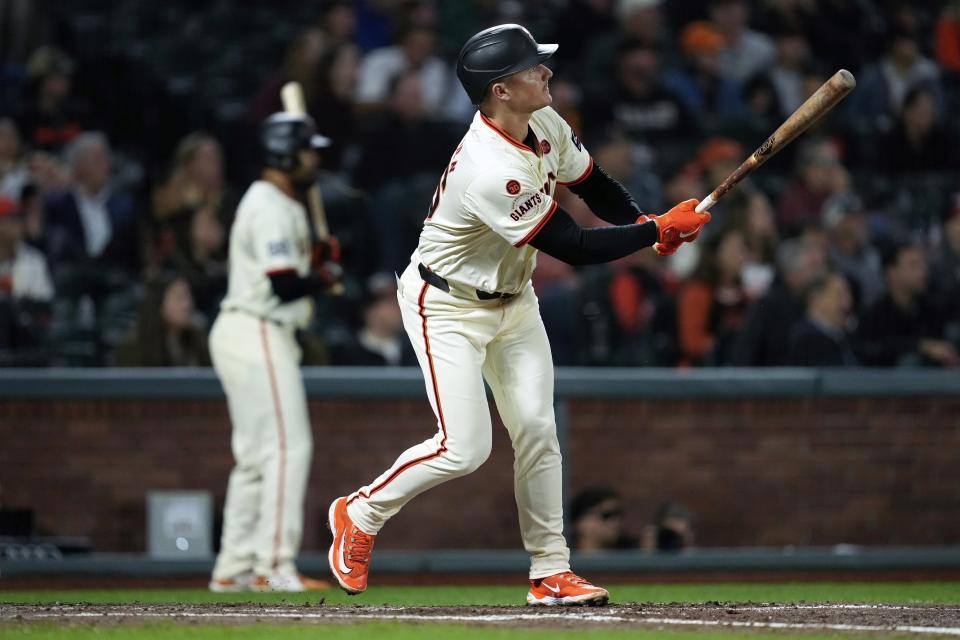 San Francisco Giants' Matt Chapman watches his solo home run during the fourth inning of a baseball game against the Milwaukee Brewers, Wednesday, Sept. 11, 2024, in San Francisco. (AP Photo/Godofredo A. Vásquez)