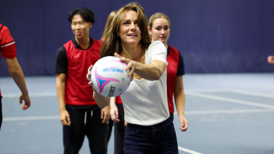 Catherine, Princess of Wales holds a ball at Bisham Abbey National Sports Centre