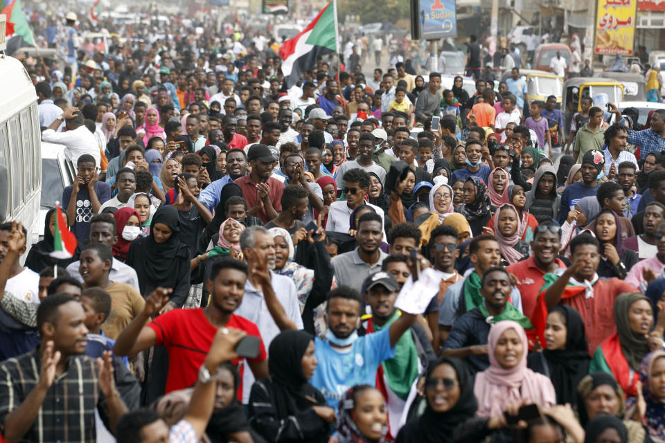 Sudanese protesters march during a demonstration in Khartoum, Sudan, Thursday, Aug. 1, 2019. Sudanese pro-democracy activists have posted videos on social media showing thousands of people taking to the streets in the capital, Khartoum. The Sudanese Professionals Association said Thursday that the rallies are demanding justice for the killing of at least six people, including four students, earlier this week during student protests in a central province. (AP Photo)