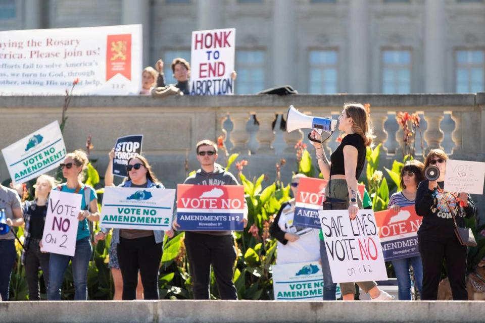 Protestors gather below a Yes for Life rally at the State Capitol in Frankfort, Ky., Saturday, October 1, 2022. A counter rally took place at the same time from Protect KY Access.