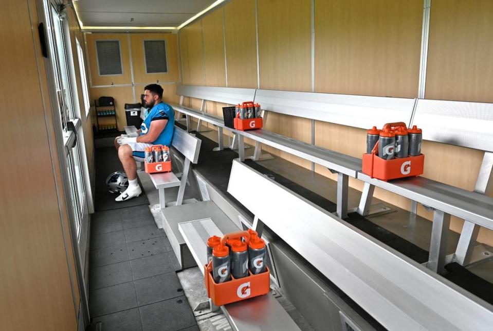 Carolina Panthers guard J.D. DiRenzo sits in the cooling trailer prior to the start of practice on Tuesday, August 6, 2024.