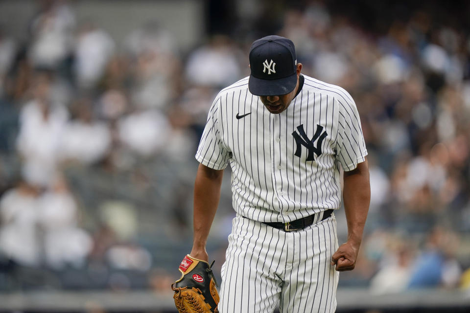 New York Yankees relief pitcher Wandy Peralta reacts during the fourth inning of a baseball game against the Tampa Bay Rays, Sunday, Oct. 3, 2021, in New York. (AP Photo/Frank Franklin II)