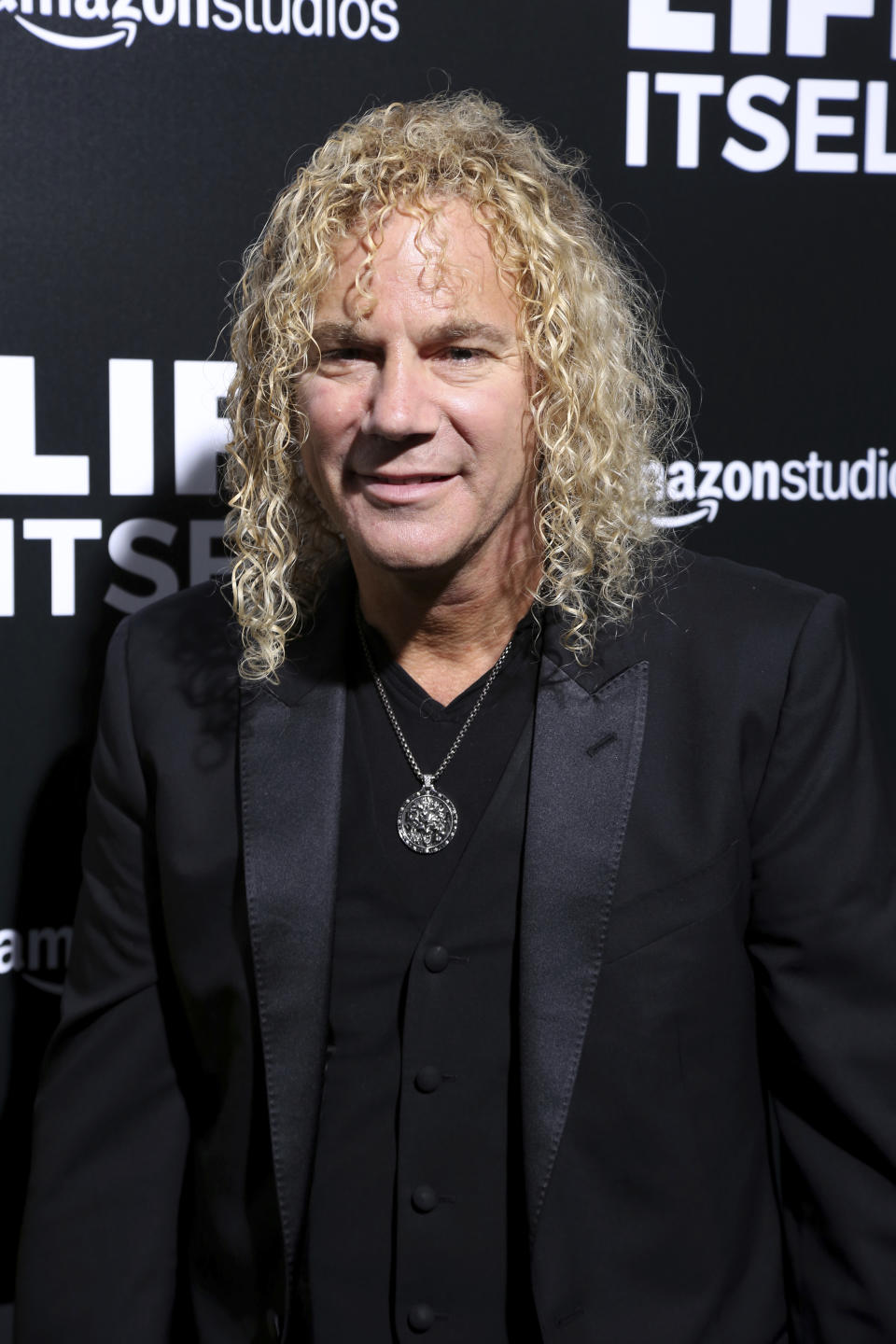 FILE - This Sept. 13, 2018 file photo shows David Bryan, member of Bon Jovi at the premiere of "Life Itself" in Los Angeles. Bryan, the keyboardist for Bon Jovi is embarking on a busy 2020, with a new album and tour with one of America's favorite rock bands as well as opening his second Broadway musical, “Diana." (Photo by Willy Sanjuan/Invision/AP, File)