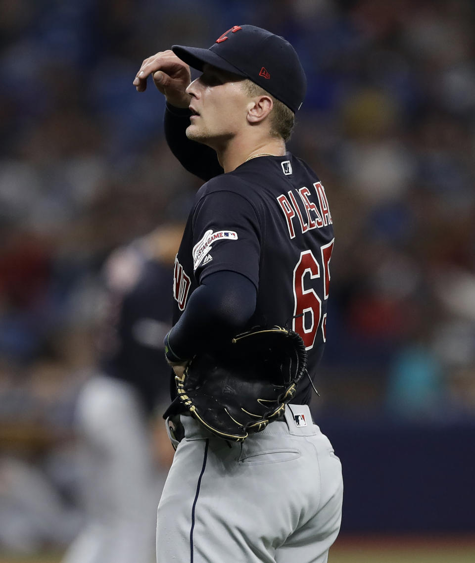 Cleveland Indians' Zach Plesac reacts after giving up a two-run home run to Tampa Bay Rays' Tommy Pham during the third inning of a baseball game Saturday, Aug. 31, 2019, in St. Petersburg, Fla. (AP Photo/Chris O'Meara)