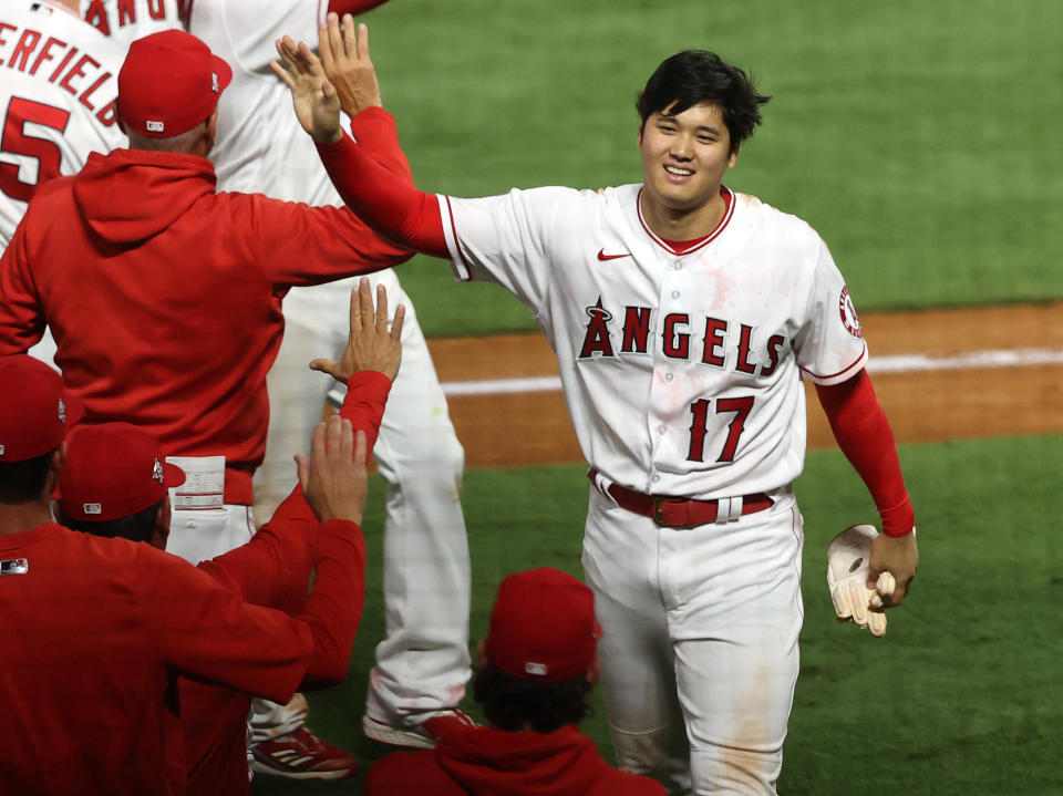 ANAHEIM, CALIFORNIA - JULY 02:  Shohei Ohtani #17 of the Los Angeles Angels celebrates after defeating the Baltimore Orioles 8-7 in the ninth inning at Angel Stadium of Anaheim on July 02, 2021 in Anaheim, California. (Photo by Ronald Martinez/Getty Images)