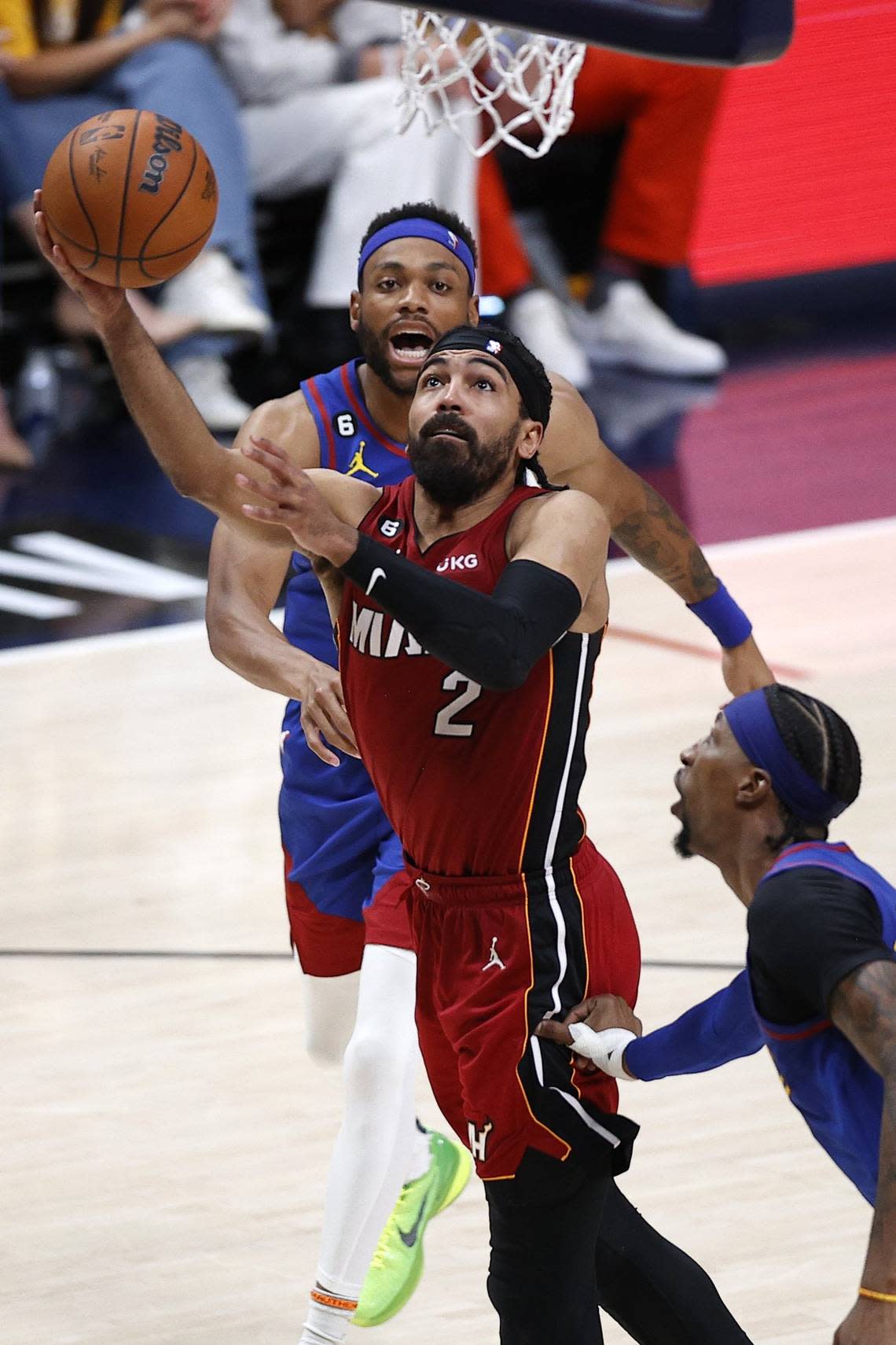 Jun 1, 2023; Denver, CO, USA; Miami Heat guard Gabe Vincent (2) goes to the basket during the fourth quarter in game one of the 2023 NBA Finals against the Denver Nuggets at Ball Arena. Mandatory Credit: Isaiah J. Downing-USA TODAY Sports