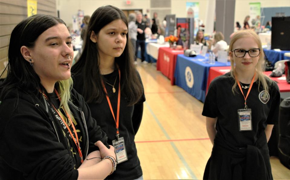 Tri-Rivers Career Center students Stefan Long, Kassidy DeSouza, and Cailea Williams listen to directions as they prepare to conduct interviews for The Industrial Channel with people attending the Marion Campus Job and Internship Fair on Wednesday, April 12, 2023, at The Ohio State University at Marion.