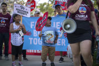 <p>Young children and adults protest the Trump administration policy of separating children from parents arrested for illegally crossing the U.S.-Mexico border on June 14, 2018, in Los Angeles, Calif. (Photo: David McNew/Getty Images) </p>