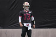 San Francisco 49ers quarterback Brock Purdy (13) warms up during a practice ahead of the Super Bowl 58 NFL football game Friday, Feb. 9, 2024, in Las Vegas. (AP Photo/John Locher)