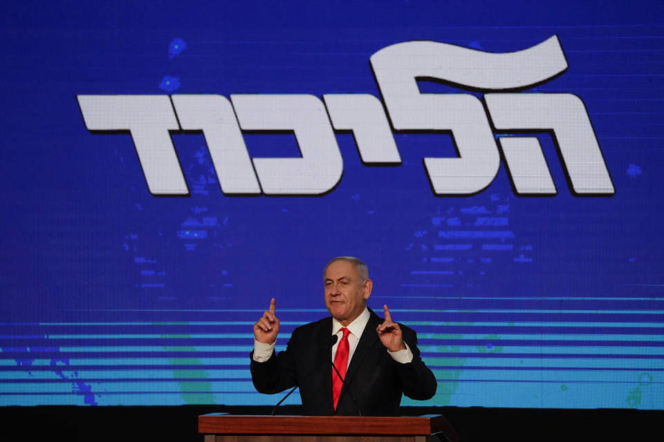 Israeli Prime Minister Benjamin Netanyahu delivers a speech following the announcement of the first exit poll results for the Israeli parliamentary elections, at his Likud party headquarters in Jerusalem, Wednesday, March. 24, 2021. (AP Photo/Maya Alleruzzo)