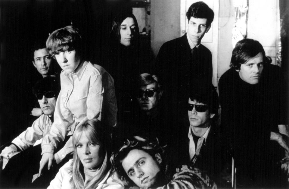 Andy Warhol (center) with Lou Reed (right) and The Velvet Underground. (Photo: Courtesy Everett Collection)