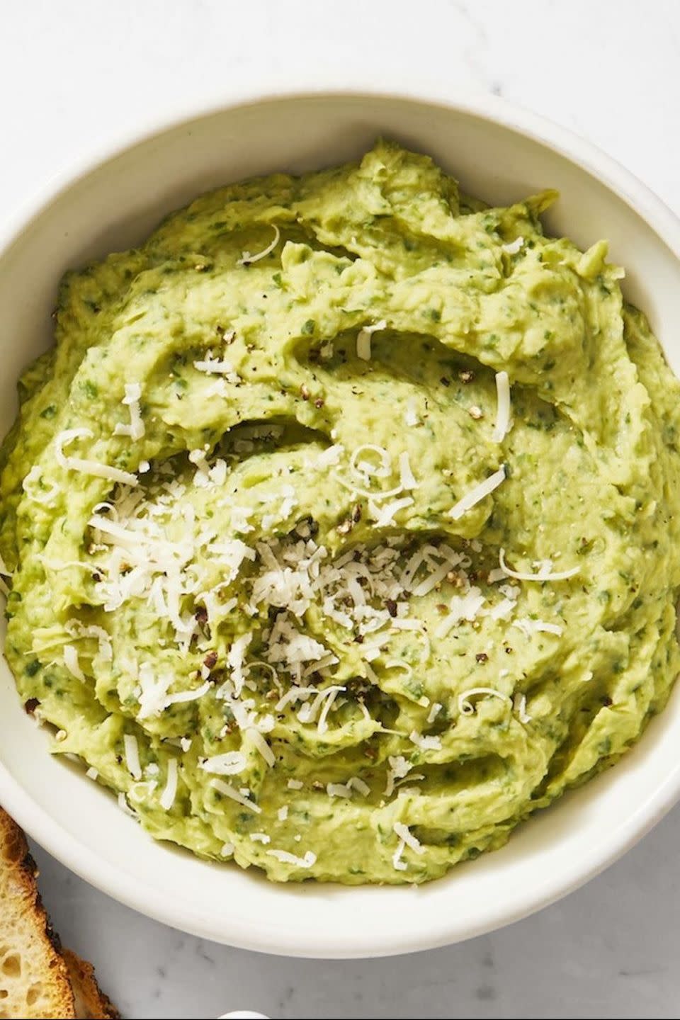 <p>Zesty, creamy and cheesy, this dip is the perfect pairing for crackers, breads, veggies and chips.</p><p>Get the <a href="https://www.goodhousekeeping.com/food-recipes/a28497576/best-ever-spinach-and-artichoke-dip-recipe/" rel="nofollow noopener" target="_blank" data-ylk="slk:Spinach and Artichoke Dip recipe;elm:context_link;itc:0;sec:content-canvas" class="link "><strong>Spinach and Artichoke Dip recipe</strong></a>. </p>