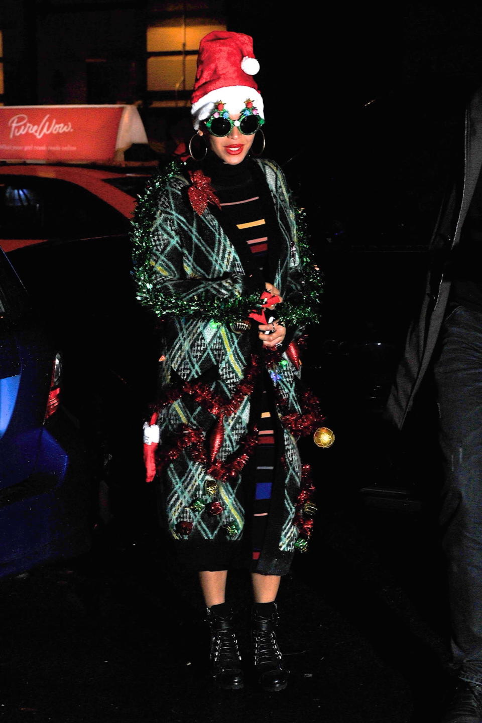 Beyoncé dressed up as a Christmas tree for her company holiday party in New York City.