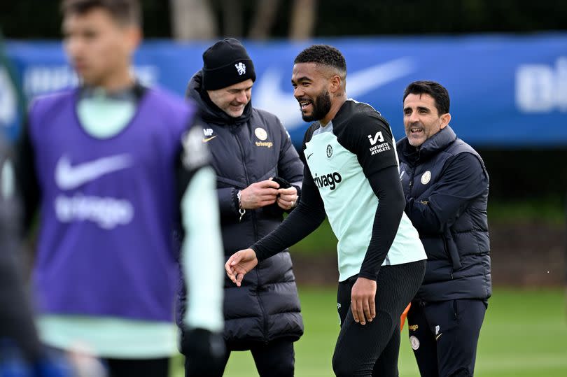 Mauricio Pochettino with Reece James and Jesus Perez