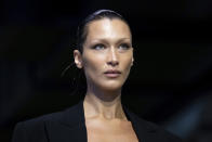 FILE - Bella Hadid models fashion from the Michael Kors collection during Fashion Week, Sept. 14, 2022, in New York. Through images that have appeared online in recent weeks, people “learned” about Hadid, a model of Palestinian descent, denouncing Hamas' attack in Israel, which didn't actually happen. Video of Hadid accepting an award for activism in Lyme Disease was manipulated to make it seem like different words were coming from her mouth. (AP Photo/Julia Nikhinson, File)